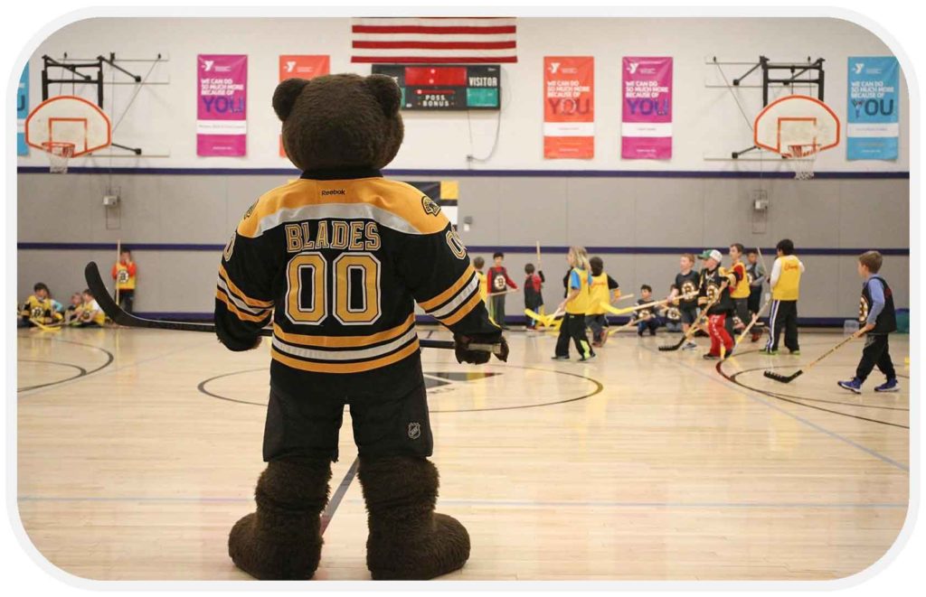 Boston Bruins mascot Blades with Bruins Youth Hockey Development team