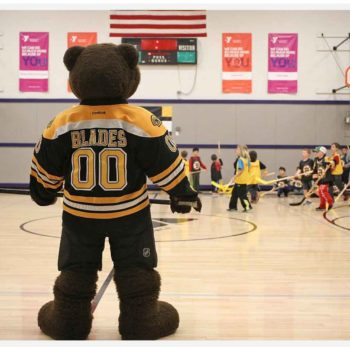 Boston Bruins mascot Blades with Bruins Youth Hockey Development team